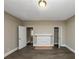 Living room with hardwood floors and fireplace, closets at 15 Johnson Nw Rd, Atlanta, GA 30318