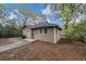 Side view of tan house with landscaping at 15 Johnson Nw Rd, Atlanta, GA 30318