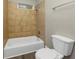 Clean bathroom featuring a tub, toilet and shower at 15 Johnson Nw Rd, Atlanta, GA 30318
