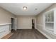 Living area with hardwood floors, fireplace and closet at 15 Johnson Nw Rd, Atlanta, GA 30318
