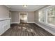Spacious living room featuring hardwood floors and fireplace at 15 Johnson Nw Rd, Atlanta, GA 30318