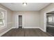 Bright bedroom with hardwood floors and access to other rooms at 15 Johnson Nw Rd, Atlanta, GA 30318