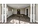 Spacious living area with hardwood floors and white columns at 15 Johnson Nw Rd, Atlanta, GA 30318