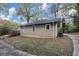 Tan house with deck and landscaping at 15 Johnson Nw Rd, Atlanta, GA 30318