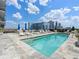 Resort-style rooftop pool with lounge chairs at 1065 Peachtree Ne St # 3505, Atlanta, GA 30309