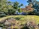 Picturesque white house with a screened porch and well-manicured lawn at 3970 Norman Rd, Stone Mountain, GA 30083