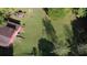 Aerial view showing house and large backyard with detached barn at 2681 Buford Hwy, Cumming, GA 30041