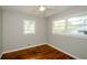 Charming bedroom with hardwood floors and multiple windows at 123 Arnold Pl, Jonesboro, GA 30236