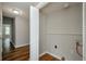 Bright laundry area with built-in shelving and vinyl flooring at 123 Arnold Pl, Jonesboro, GA 30236