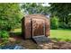 Brown metal storage shed with wooden ramp at 123 Arnold Pl, Jonesboro, GA 30236