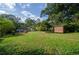 Spacious backyard with shed and partial view of house at 123 Arnold Pl, Jonesboro, GA 30236
