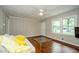 Living room with hardwood floors, neutral walls and a comfy sofa at 123 Arnold Pl, Jonesboro, GA 30236