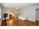Bright living room features hardwood floors, neutral walls and a comfy sofa at 123 Arnold Pl, Jonesboro, GA 30236