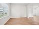 Spacious living room with light wood flooring and large windows at 3024 Viewpark Cir, Conyers, GA 30013