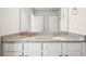 Double vanity bathroom with granite countertop at 3024 Viewpark Cir, Conyers, GA 30013