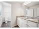 Bathroom with granite countertop and double vanity at 3024 Viewpark Cir, Conyers, GA 30013
