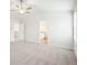 Spacious bedroom with carpet flooring and en-suite bathroom access at 3024 Viewpark Cir, Conyers, GA 30013