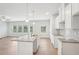Kitchen with white cabinets, granite countertops, and an island at 3024 Viewpark Cir, Conyers, GA 30013