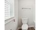 Simple toilet and shower area in a small bathroom at 3024 Viewpark Cir, Conyers, GA 30013