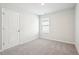 Simple bedroom with neutral walls and carpet at 3024 Viewpark Cir, Conyers, GA 30013