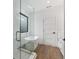 Elegant bathroom with soaking tub and glass shower at 420-D Parkway Ne Dr, Atlanta, GA 30308