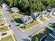 Aerial view showcasing a charming two-story home situated in a quiet residential neighborhood at 1995 Woodmont Dr, Douglasville, GA 30135