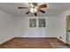 Living room with hardwood floors and neutral walls at 2341 Cedar Dr, Lawrenceville, GA 30043