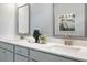 Modern bathroom with double vanity, mirrors, and contemporary fixtures at 6200 Misty Hill Ln, Buford, GA 30518