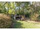 Spacious backyard with storage shed and fenced area at 150 E Main St, Rutledge, GA 30663