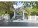 Spacious backyard deck with gazebo and white railings at 150 E Main St, Rutledge, GA 30663