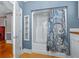 Small bathroom with shower/tub combo and built-in shelving at 150 E Main St, Rutledge, GA 30663