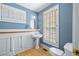 Simple bathroom with pedestal sink, toilet, and shower/tub combo at 150 E Main St, Rutledge, GA 30663