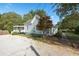 House exterior showing side elevation and landscaping at 150 E Main St, Rutledge, GA 30663