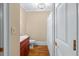 Bathroom with a shower/tub combo and red vanity at 150 E Main St, Rutledge, GA 30663