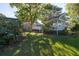 Large backyard with gazebo, deck, and lush greenery at 150 E Main St, Rutledge, GA 30663