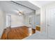Spacious bedroom with hardwood floors and access to other rooms at 150 E Main St, Rutledge, GA 30663