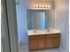 Bathroom with double vanity and large mirror at 6148 Indian Wood Se Cir, Mableton, GA 30126