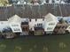 Aerial view of townhomes, highlighting private decks and yards at 6148 Indian Wood Se Cir, Mableton, GA 30126