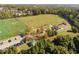 Aerial view of sports complex with soccer fields, playground, and parking at 6148 Indian Wood Se Cir, Mableton, GA 30126