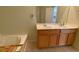 Bathroom with double vanity and large mirror at 6148 Indian Wood Se Cir, Mableton, GA 30126