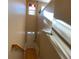 Interior view of a staircase with light-colored walls and wooden railing at 6148 Indian Wood Se Cir, Mableton, GA 30126