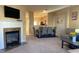 Open living space with a fireplace, dining area, and kitchen at 6148 Indian Wood Se Cir, Mableton, GA 30126