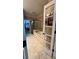 Elegant bathroom with soaking tub, shower, and tiled floors at 1175 Grassy Oat Ln, Lawrenceville, GA 30045