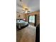 Bright bedroom with a queen bed and plenty of natural light at 1175 Grassy Oat Ln, Lawrenceville, GA 30045