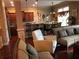 Open concept kitchen and living area with hardwood floors at 1175 Grassy Oat Ln, Lawrenceville, GA 30045