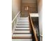 Elegant staircase with wood and wrought-iron details at 1175 Grassy Oat Ln, Lawrenceville, GA 30045