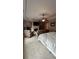Spacious main bedroom with sitting area, fireplace, and large windows at 1175 Grassy Oat Ln, Lawrenceville, GA 30045