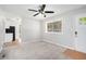 Bright living room with grey carpet, and view of kitchen at 2623 Rex Sw Ave, Atlanta, GA 30331