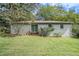 Brick house exterior with a wooden deck and green lawn at 2623 Rex Sw Ave, Atlanta, GA 30331