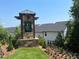 Community entrance with stone signage and nearby homes at 4500 Byrnes St, Duluth, GA 30097